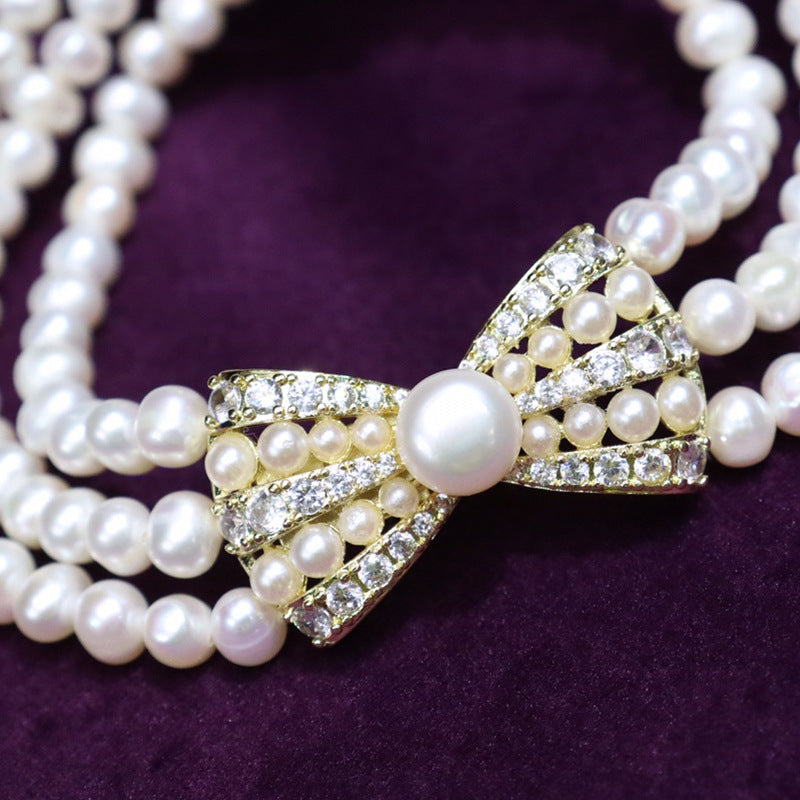 Natural Freshwater Pearl Necklace 6-7mm - Strong Light - Nearly Round - Slightly Flawed