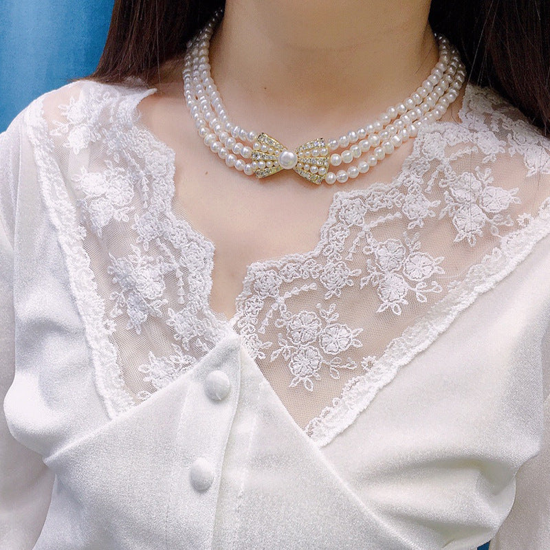 Natural Freshwater Pearl Necklace 6-7mm - Strong Light - Nearly Round - Slightly Flawed