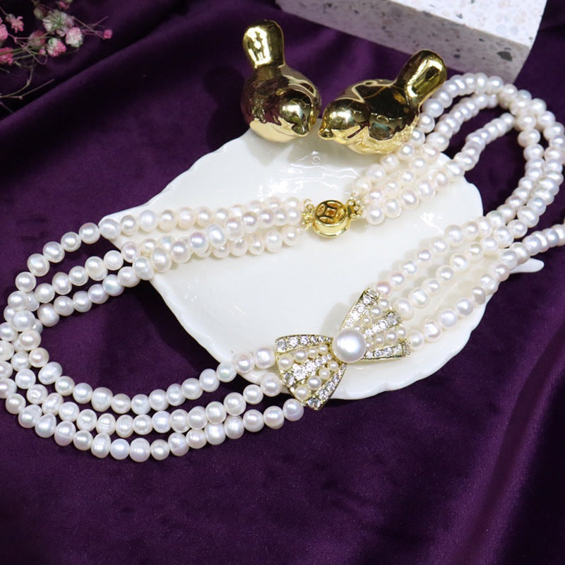 Natural Freshwater Pearl Necklace 6-7mm - Strong Light - Nearly Round - Slightly Flawed