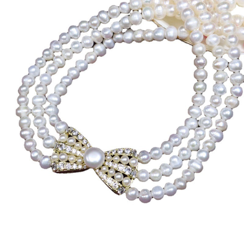 Natural Freshwater Pearl Necklace 6-7mm - Strong Light - Nearly Round - Slightly Flawed